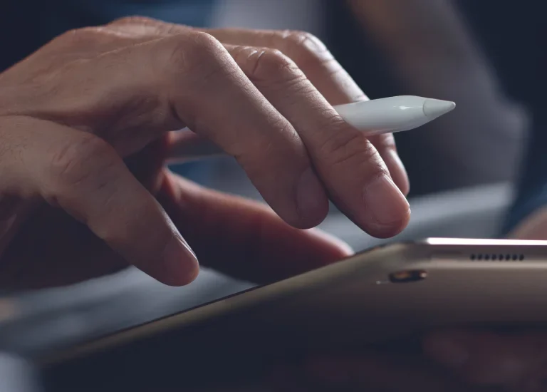 a close up of a person using a tablet